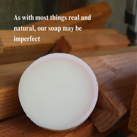 troutcreeksoaps bar held in hand demonstrating 4oz scale and travel-friendly size benefit