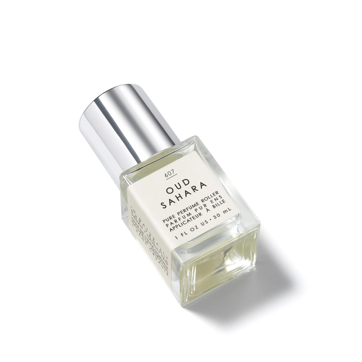 Tru Fragrance Beauty bottle beside ruler illustrating 30ml size benefit: accurate scale understanding