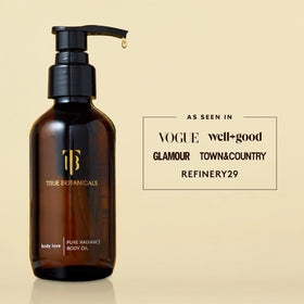 True Botanicals bottle held in hand for scale, indicates travel-friendly 3.9 fl oz