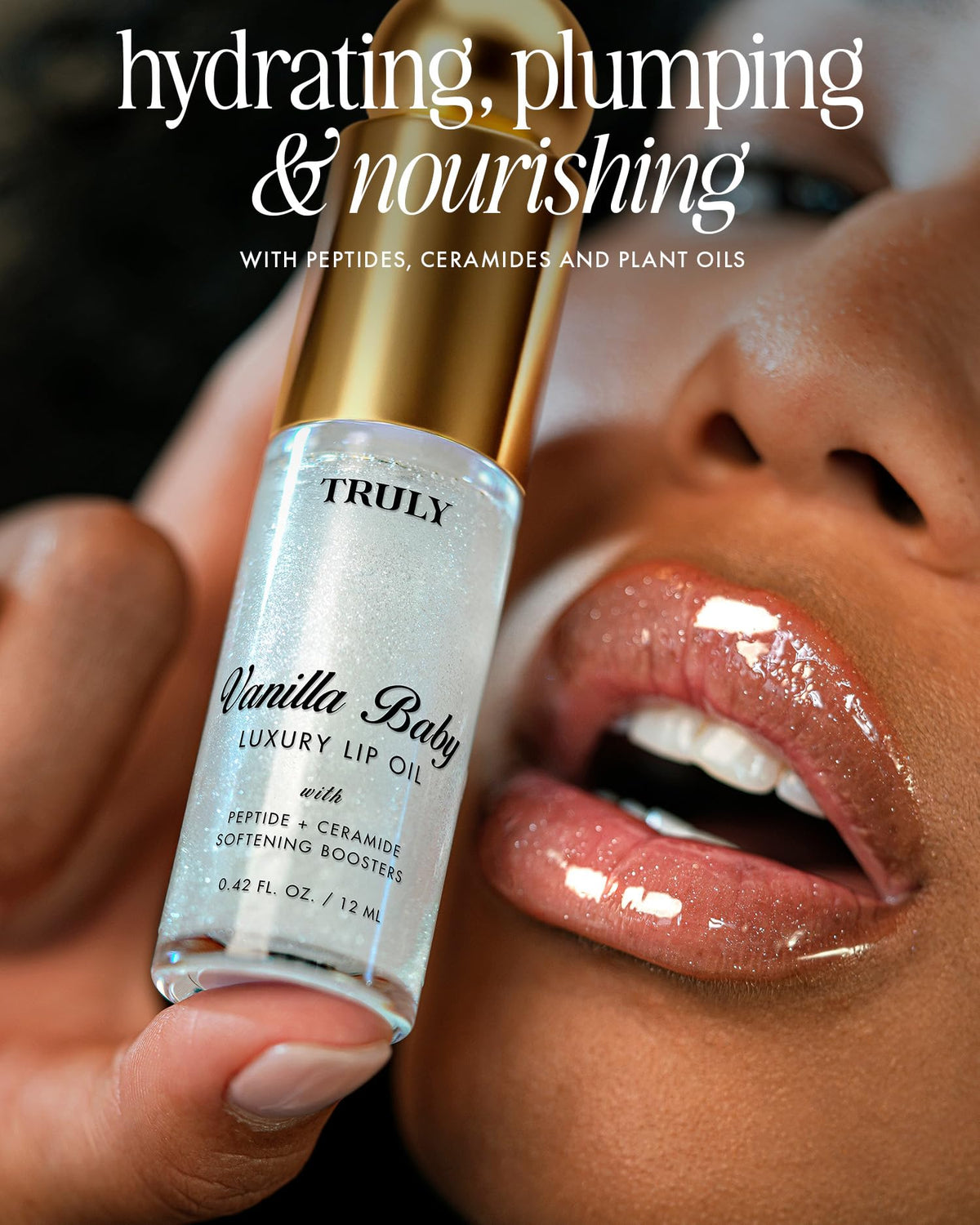 Truly Soft Serve on lips in studio showing soft-pink tint and plumping effect