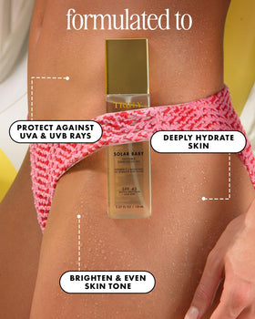 Truly Solar Baby texture oil close-up drop showing lightweight glide and fast absorption