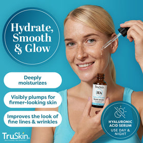 TruSkin serum texture droplet on skin showing lightweight absorption benefit