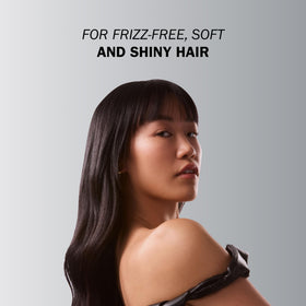 TRUSS spray texture on hand highlighting non-greasy slip and detangling benefit