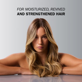 TRUSS applying Miracle Summer Mask to wet mid-lengths to restore damaged hair