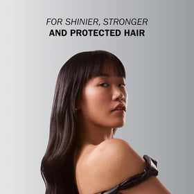 TRUSS treatment applied to wet hair demonstrating repair application benefit