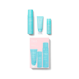 TULA lifestyle shot applying gel to cheek illustrating targeted acne treatment