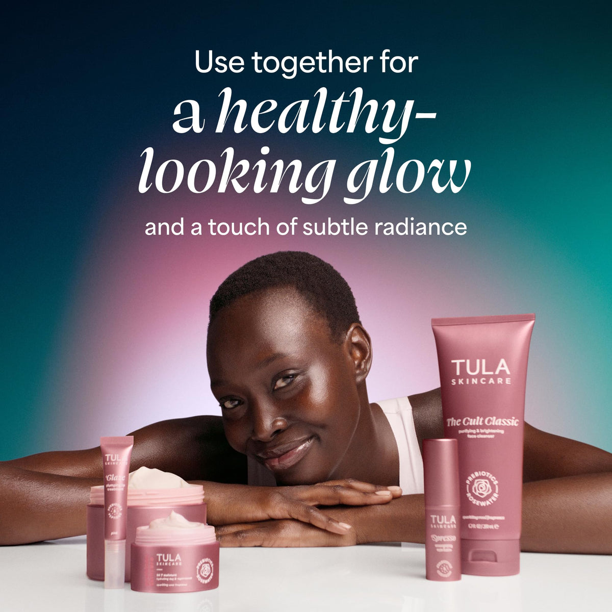 TULA product beside bag and mirror showing everyday carry convenience