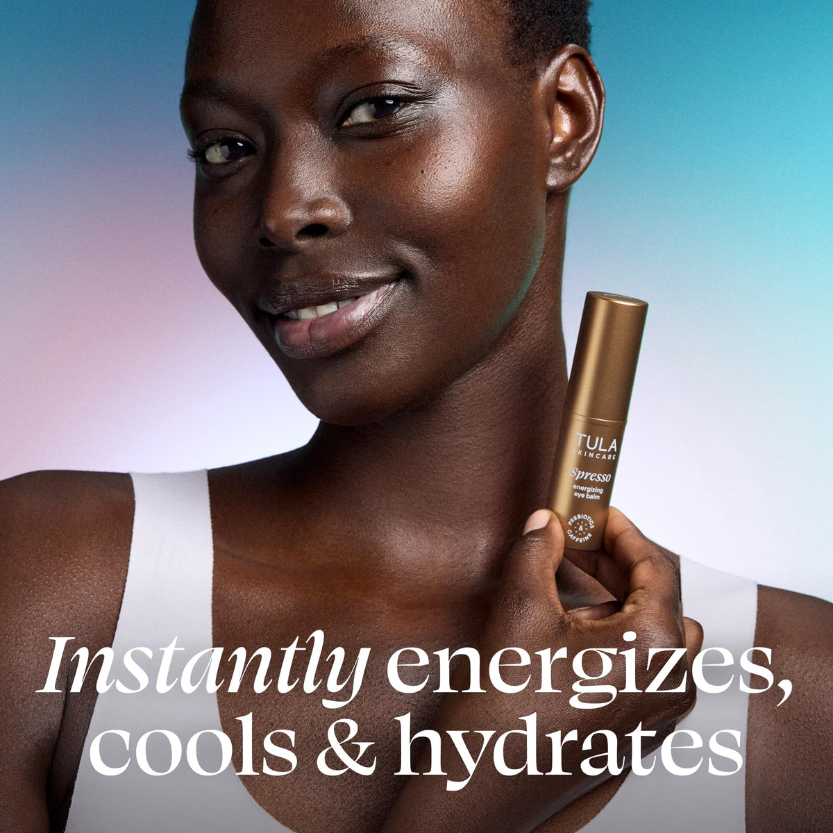 TULA Spresso eye balm texture closeup showing creamy glide and hydrating finish