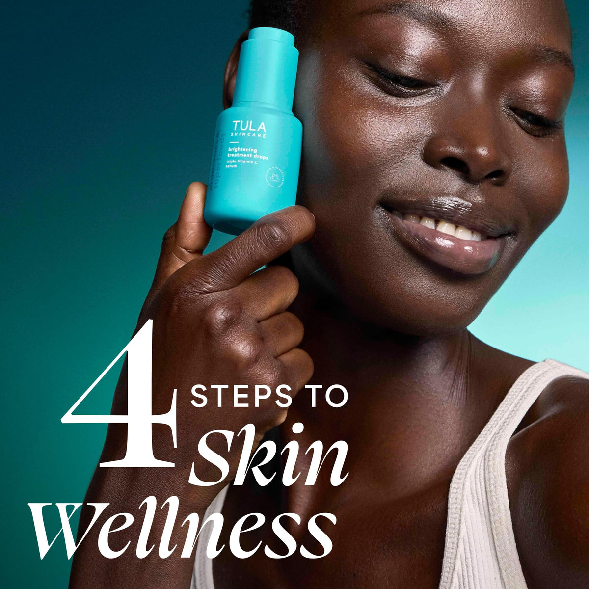 TULA vitamin C serum dropper highlighting concentrated formula for radiance