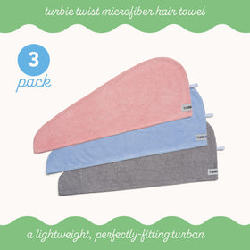 Turbie Twist worn on head with secure button, keeps hair contained during styling