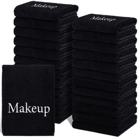 TURSTIN front stack of 24 black towels showing bulk supply benefit