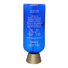 Two Old Goats lotion texture close-up demonstrating smooth absorbent feel and moisturizing benefit