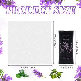 twoworld towel packet next to a hand for scale showing portable single-serve size