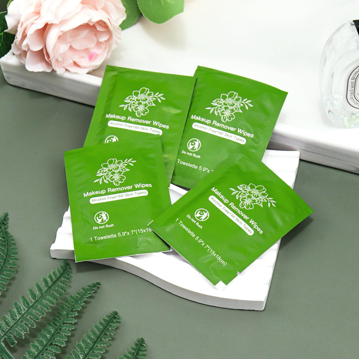 twoworld wipes in travel toiletry setup highlighting portability and convenience