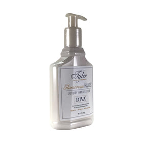 TYLER CANDLE COMPANY applying lotion in hand for instant softening benefit