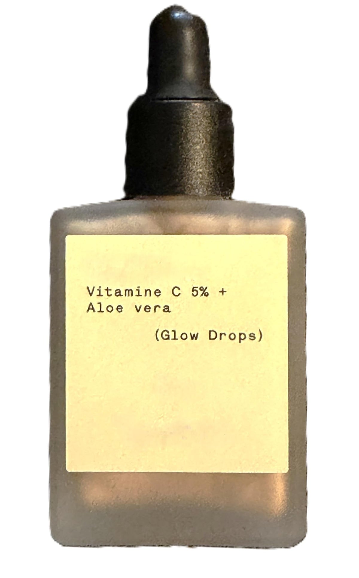 Typology bottle front view showing elegant label and compact size benefit: clear product identity