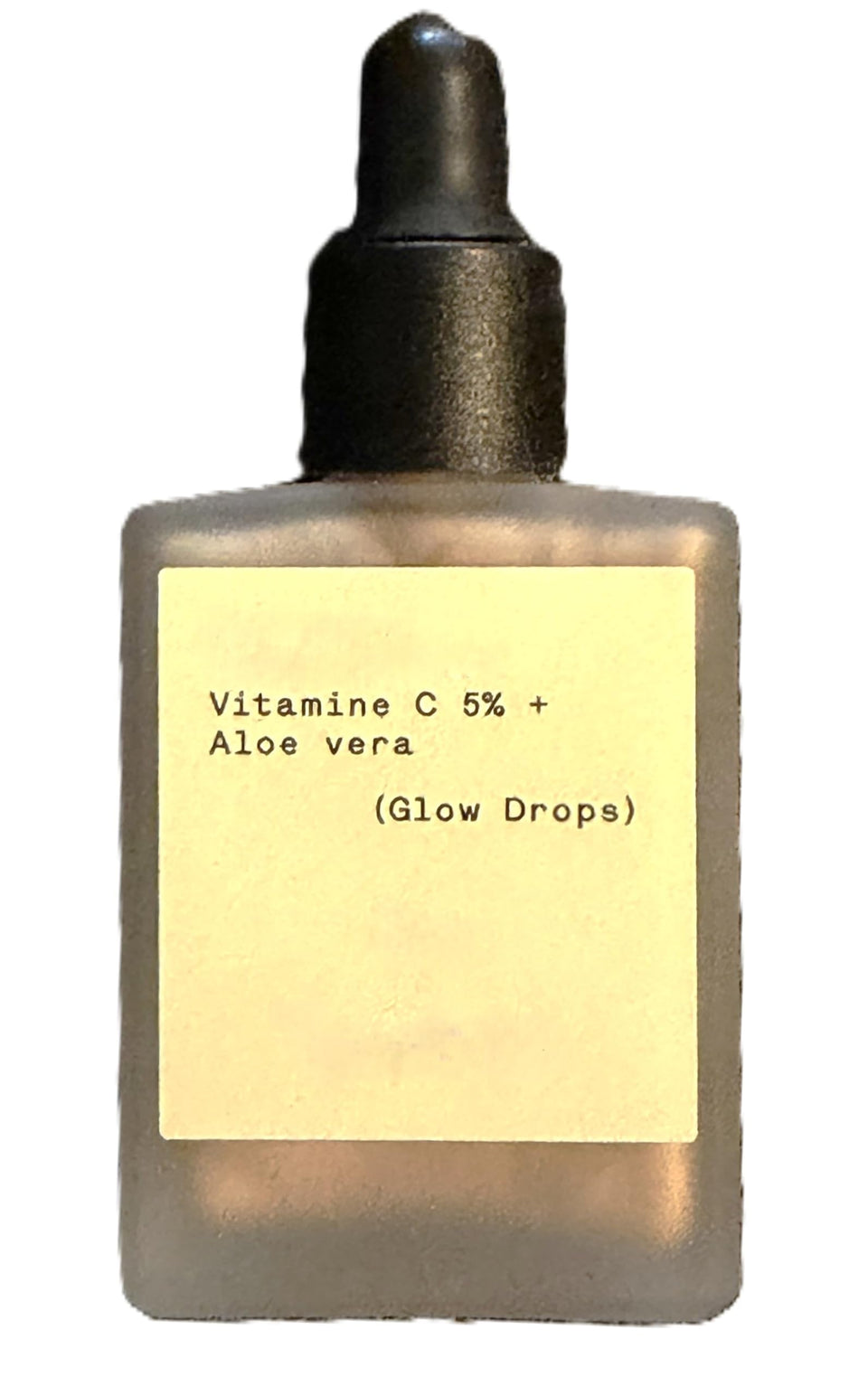 Typology bottle front view showing elegant label and compact size benefit: clear product identity