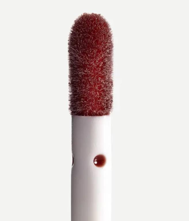 Typology close-up of lip oil texture revealing non-sticky hydration benefit