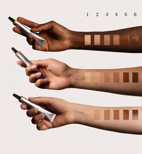 Typology concealer Type 1 swatch on skin close-up showing blendable texture benefit natural finish