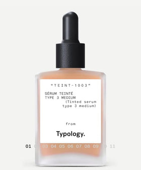 Typology tinted serum dropper close-up displaying lightweight texture