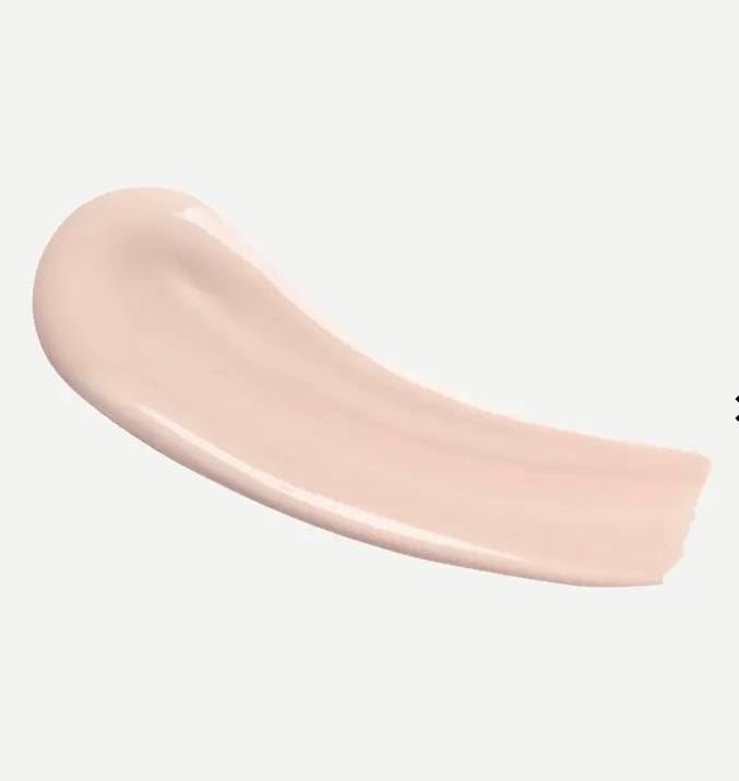 Typology tinted serum texture closeup demonstrating creamy, hydrating finish and blendability