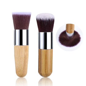 UCANBE kit flatlay with two bottles, brushes, and sponges for complete routine