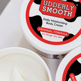 UDDERLY SMOOTH cream spread on elbow, demonstrating smoothing of dry patches