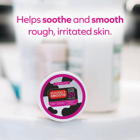 Udderly Smooth label close-up noting dermatologist-tested and unscented