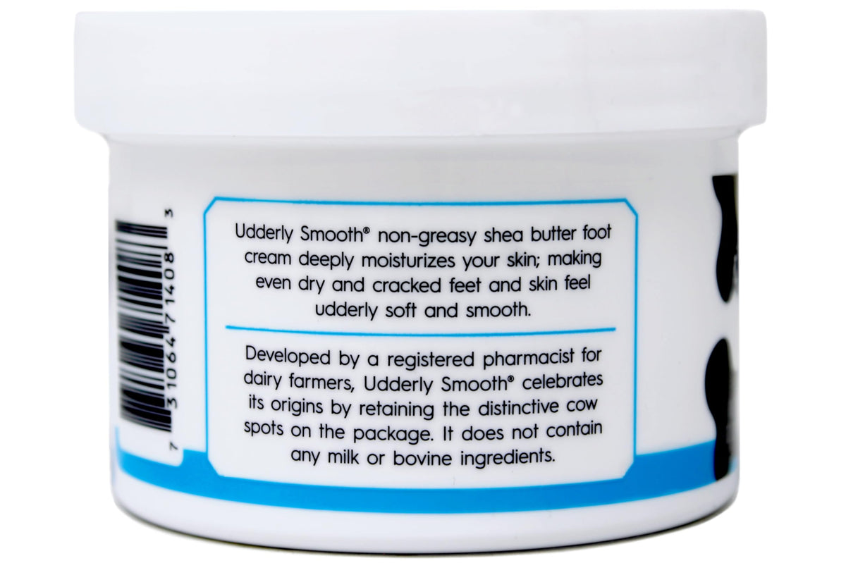 Udderly Smooth tub held in hand showing 8 oz scale for long-lasting supply