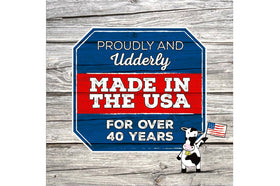Udderly Smooth tub beside socks lifestyle scene showing use before wearing footwear