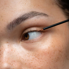 UKLASH sensitive next to lash extensions demonstrating compatibility with extensions