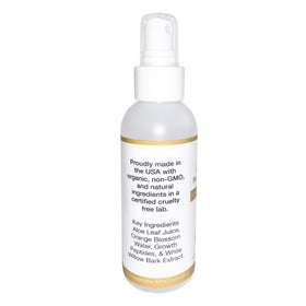 UltimateVitality model spraying scalp to show easy daily use benefit