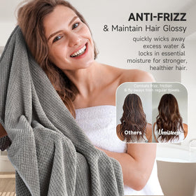 Umisleep towel beside hairbrush showing extra-large size benefit