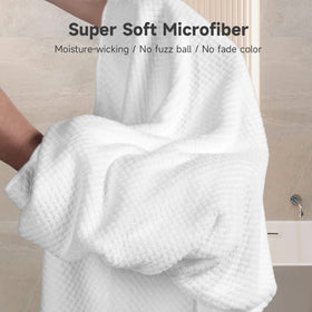 Umisleep towel next to ruler showing 40x30 inch oversized coverage