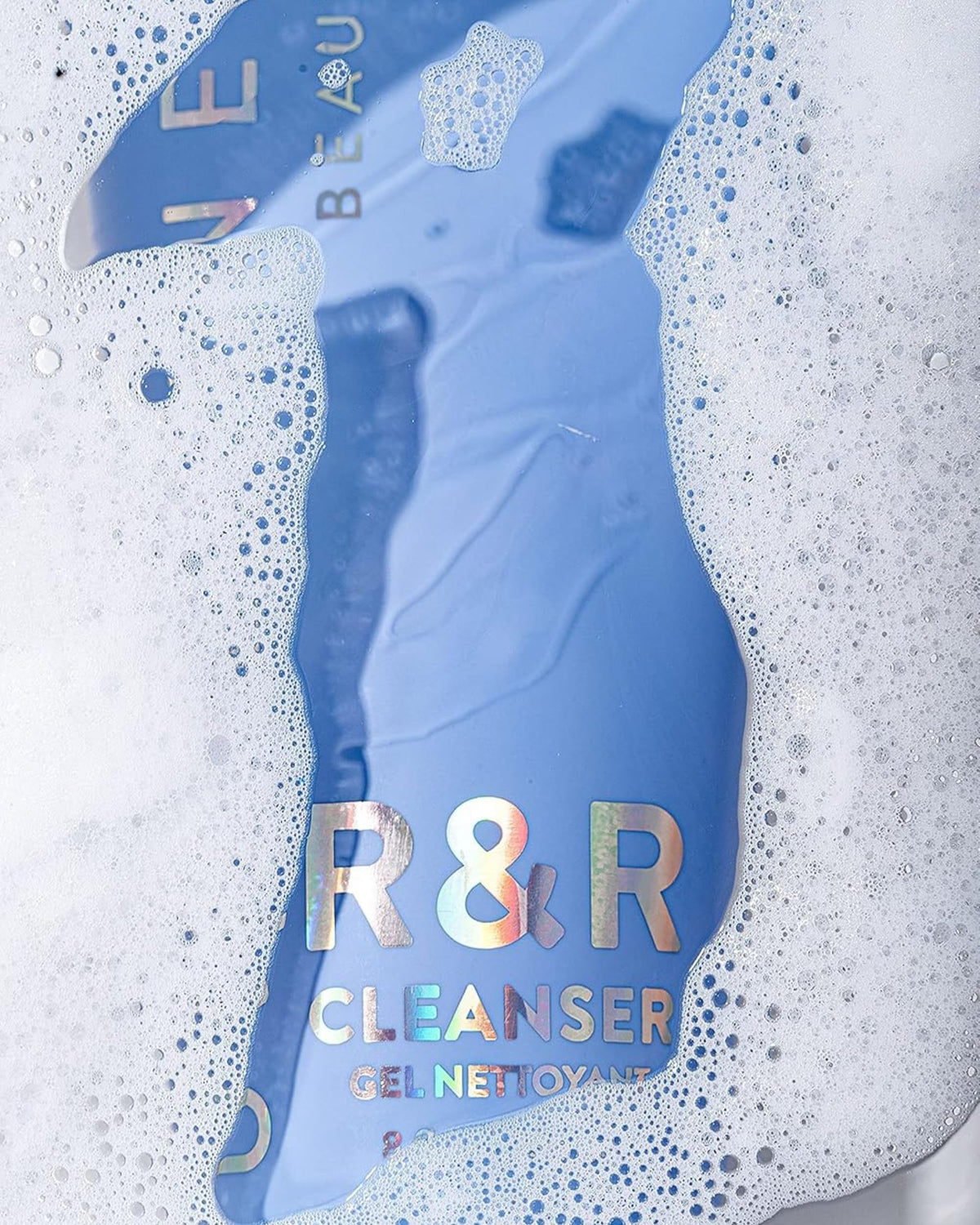 Undefined R&R Cleanser in use washing face showing gentle effective cleanse