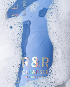 Undefined R&R Cleanser in use washing face showing gentle effective cleanse