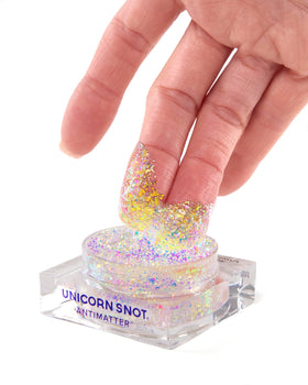 UNICORN SNOT model cheek with Laser paste showing color-shift and long-wear benefit