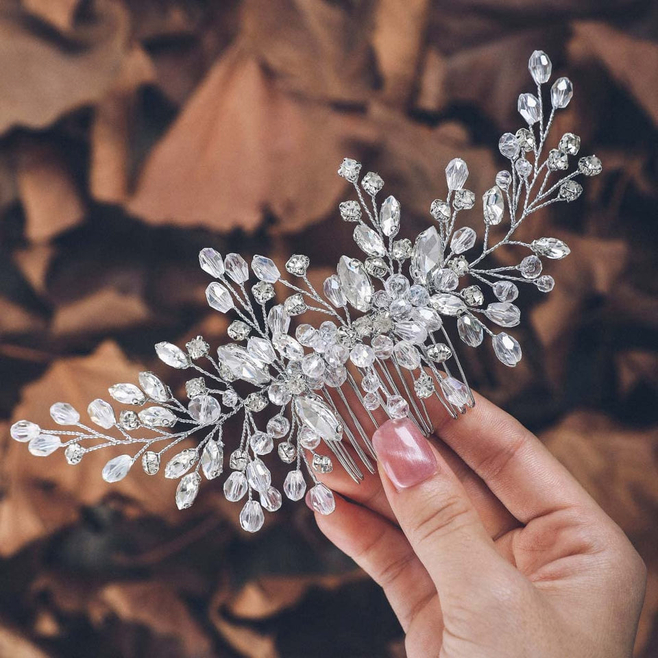 Unicra front view of silver rhinestone hair comb showing elegant floral design