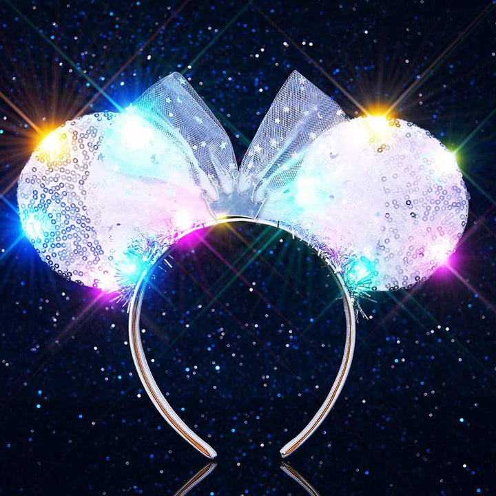 Unicra silver sequin headband front view showing sparkling ears and bow benefit visibility