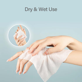 UNIFREE moistened wipe in hand demonstrating strong wet use