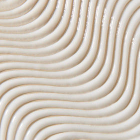 UNITE 7SECONDS cream texture on fingers demonstrating lightweight spread