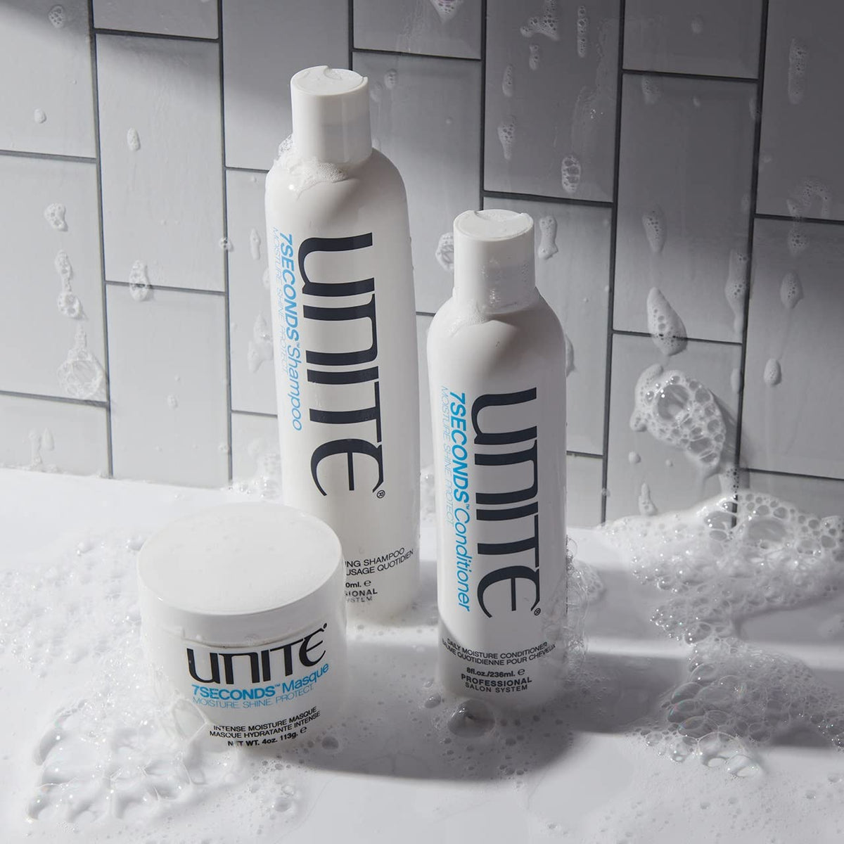 UNITE bottle size comparison showing 4 fl oz for travel and salon use