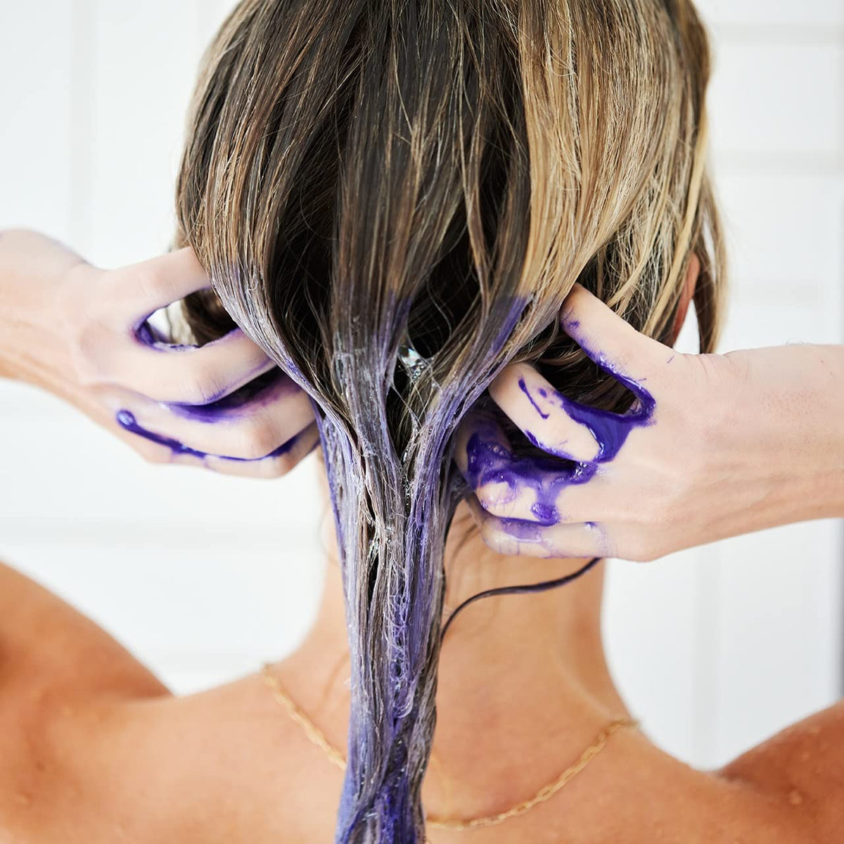 UNITE Hair BLONDA dispensed into hand demonstrating easy application