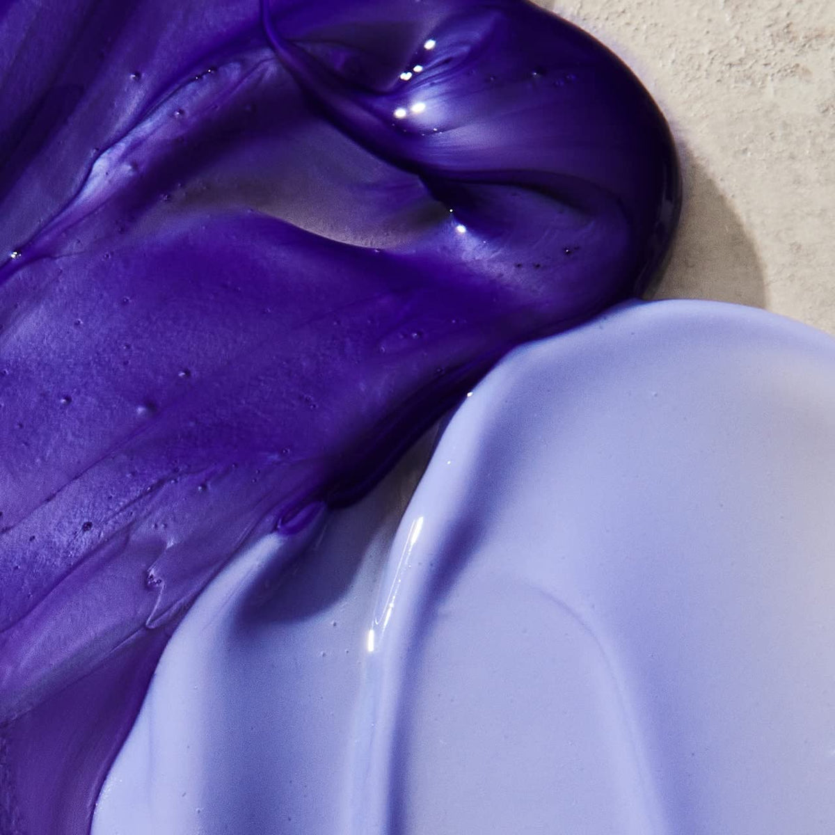 UNITE Hair BLONDA purple lather on wet strands showing toning action