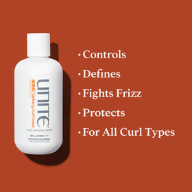 UNITE applying cream to damp curls for definition and frizz control