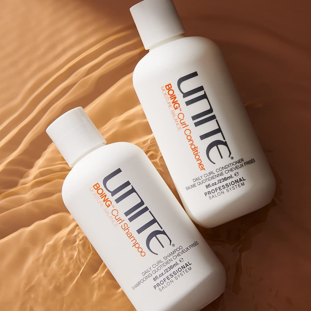 UNITE BOING shampoo being poured and foaming, demonstrates easy lather benefit