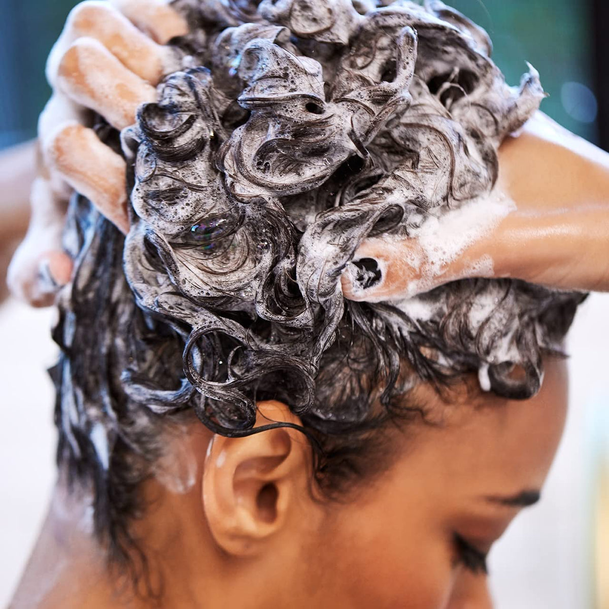 UNITE BOING cream-to-foam texture close-up showing lightweight conditioning