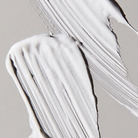 UNITE BOOSTA in use during blow-drying creating visible root lift and touchable fullness