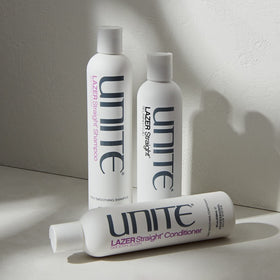 UNITE LAZER Straight shampoo bottle next to ruler for scale showing 10 fl oz practicality
