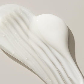 UNITE U LUXURY on shower shelf in bathroom for salon-quality hydration